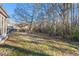 A beautiful backyard featuring an idyllic and natural setting that offers peace and privacy at 845 Melbourne Trl, Alpharetta, GA 30009
