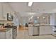 Modern kitchen with stainless steel appliances, granite countertops, and an island at 845 Melbourne Trl, Alpharetta, GA 30009