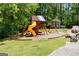 Community playground provides a place for outdoor fun at 845 Melbourne Trl, Alpharetta, GA 30009