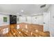 Spacious living room with hardwood floors and an elegant electric fireplace at 2798 Hutchins Rd, Lawrenceville, GA 30044
