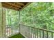 Private balcony view surrounded by lush greenery offering a serene, private outdoor experience at 3135 Seven Pines Ct # 8, Atlanta, GA 30339