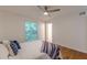 Cozy bedroom with hardwood flooring and a large window providing natural light and wooded views at 3135 Seven Pines Ct # 8, Atlanta, GA 30339