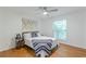 Bright bedroom featuring a ceiling fan, hardwood floors and a window providing natural light at 3135 Seven Pines Ct # 8, Atlanta, GA 30339