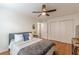 Bright bedroom with ceiling fan, wooden floors, closet, neutral walls, and tastefully decorated at 3135 Seven Pines Ct # 8, Atlanta, GA 30339