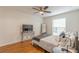 Cozy bedroom with hardwood flooring, ceiling fan and ample natural light at 3135 Seven Pines Ct # 8, Atlanta, GA 30339