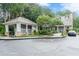 Community clubhouse features a covered mailbox area, landscaping, and ample parking at 3135 Seven Pines Ct # 8, Atlanta, GA 30339