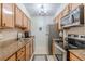 Bright kitchen with stainless steel appliances, granite countertops, and wood cabinetry at 3135 Seven Pines Ct # 8, Atlanta, GA 30339