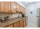 Efficient kitchen with stainless steel appliances, granite countertops, and ample cabinet space at 3135 Seven Pines Ct # 8, Atlanta, GA 30339