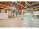 Unfinished basement with exposed ceiling beams and concrete floor at 94 Park W Ave, Dallas, GA 30157