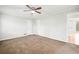 This carpeted bedroom with neutral walls provides a calm and restful retreat at 94 Park W Ave, Dallas, GA 30157