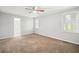 Spacious bedroom features carpet and two windows at 94 Park W Ave, Dallas, GA 30157