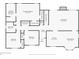 First floor layout with bedrooms, bathrooms, kitchen, dining, and living areas at 94 Park W Ave, Dallas, GA 30157