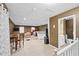 Large bonus room includes living, dining, and bath areas providing space for multiple activities at 10775 Shallowford Rd, Roswell, GA 30075