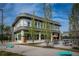 Modern commercial building with unique architecture, large windows, and an outdoor dining area at 34 Montgomery Se St, Atlanta, GA 30317