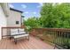 Inviting wood deck with seating area and a view of lush trees at 34 Montgomery Se St, Atlanta, GA 30317