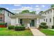 Charming brick home featuring a covered front porch and a well-manicured lawn at 34 Montgomery Se St, Atlanta, GA 30317