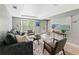 Bright living room features large windows, modern decor, and comfortable seating at 34 Montgomery Se St, Atlanta, GA 30317