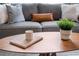 Cozy living room details include a gray sofa with throw pillows and a stylish coffee table at 34 Montgomery Se St, Atlanta, GA 30317