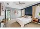 Spacious bedroom featuring tray ceilings, a king-size bed, and plenty of natural light at 34 Montgomery Se St, Atlanta, GA 30317