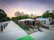 Outdoor patio featuring a dining area under a tent, creating a social and enjoyable dining space at 34 Montgomery Se St, Atlanta, GA 30317