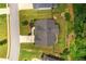 Overhead shot of a property featuring a manicured lawn, garden, and patio area in a well-maintained residential setting at 374 Heritage, Woodstock, GA 30188