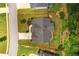 Aesthetic aerial view of the home showcases the well-manicured lawn and landscaping on a spacious lot at 374 Heritage, Woodstock, GA 30188