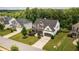 Beautiful two-story home with a welcoming front porch, well-maintained landscaping, and an attached two-car garage at 374 Heritage, Woodstock, GA 30188