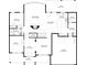 Detailed floor plan showing the layout of the first floor, including kitchen, living room, and garage at 374 Heritage, Woodstock, GA 30188