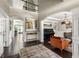 Grand foyer with hardwood floors, elegant lighting, and an open view into the living and dining areas at 374 Heritage, Woodstock, GA 30188
