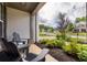 Charming front porch with Adirondack chairs overlooking a well-manicured lawn and landscaping at 374 Heritage, Woodstock, GA 30188