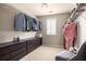 Organized walk-in closet with built-in drawers, shelving, and ample storage space at 374 Heritage, Woodstock, GA 30188