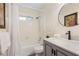 Full bathroom with a bathtub and shower, sink with vanity, and decorative accents at 4345 Tucker North Dr, Tucker, GA 30084