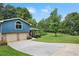 Charming two-story home with a two car garage and a well-manicured front yard at 4345 Tucker North Dr, Tucker, GA 30084