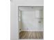 View of a bright and modern laundry room area with tile floors and simple white cabinets at 4345 Tucker North Dr, Tucker, GA 30084