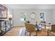 Bright living area featuring hardwood floors, large windows, and comfortable seating at 4345 Tucker North Dr, Tucker, GA 30084