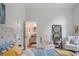 Bright main bedroom with en suite bathroom, sitting area, and neutral decor at 4345 Tucker North Dr, Tucker, GA 30084