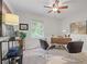 Bright office with modern desk, comfortable chairs, and window at 4345 Tucker North Dr, Tucker, GA 30084