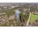 Aerial view showcasing the community pond at 4492 Arbor Crest Ct, Suwanee, GA 30024