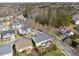 Aerial view of the neighborhood homes surrounded by trees at 4492 Arbor Crest Ct, Suwanee, GA 30024