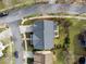 Birds-eye view of the home, roof, and surrounding landscaping at 4492 Arbor Crest Ct, Suwanee, GA 30024