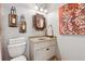 This bathroom features decorative wall hangings, vanity, and fixtures, creating a unique and decorative atmosphere at 4492 Arbor Crest Ct, Suwanee, GA 30024
