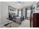 This bedroom features neutral carpeting, and ceiling fan creating a relaxing and comfortable atmosphere at 4492 Arbor Crest Ct, Suwanee, GA 30024