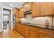 Kitchen with stainless steel appliances, gas range, and ample cabinet space at 4492 Arbor Crest Ct, Suwanee, GA 30024