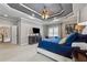Bright main bedroom with large windows, tray ceiling, and carpeted floors at 4492 Arbor Crest Ct, Suwanee, GA 30024