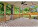 Large back porch overlooking backyard and featuring wood floors, ceiling fan, and nice railing at 462 Kendrick Se Ave, Atlanta, GA 30315