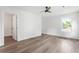Bedroom with hardwood floors, white walls and ceiling fan at 462 Kendrick Se Ave, Atlanta, GA 30315