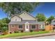 Charming two-story brick home with well-maintained lawn and a large shade tree at 462 Kendrick Se Ave, Atlanta, GA 30315