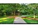 Enjoy the outdoors on this community walking path surrounded by lush trees and green space at 462 Kendrick Se Ave, Atlanta, GA 30315
