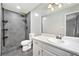 This modern bathroom features a tiled shower, dark fixtures, and updated lighting at 120 Lakeside Dr, Ellenwood, GA 30294