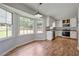 Sunny eat-in kitchen features stainless appliances, laminate countertops, and open layout at 120 Lakeside Dr, Ellenwood, GA 30294